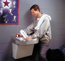 Man fills bottle from an Elkay Water Cooler with Glass Filler